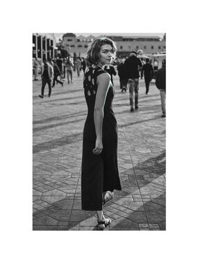 HD in Paris Black Sleeveless Jumpsuit with Button-Front and Crisscross Back